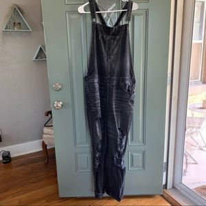 Distressed black denim overalls